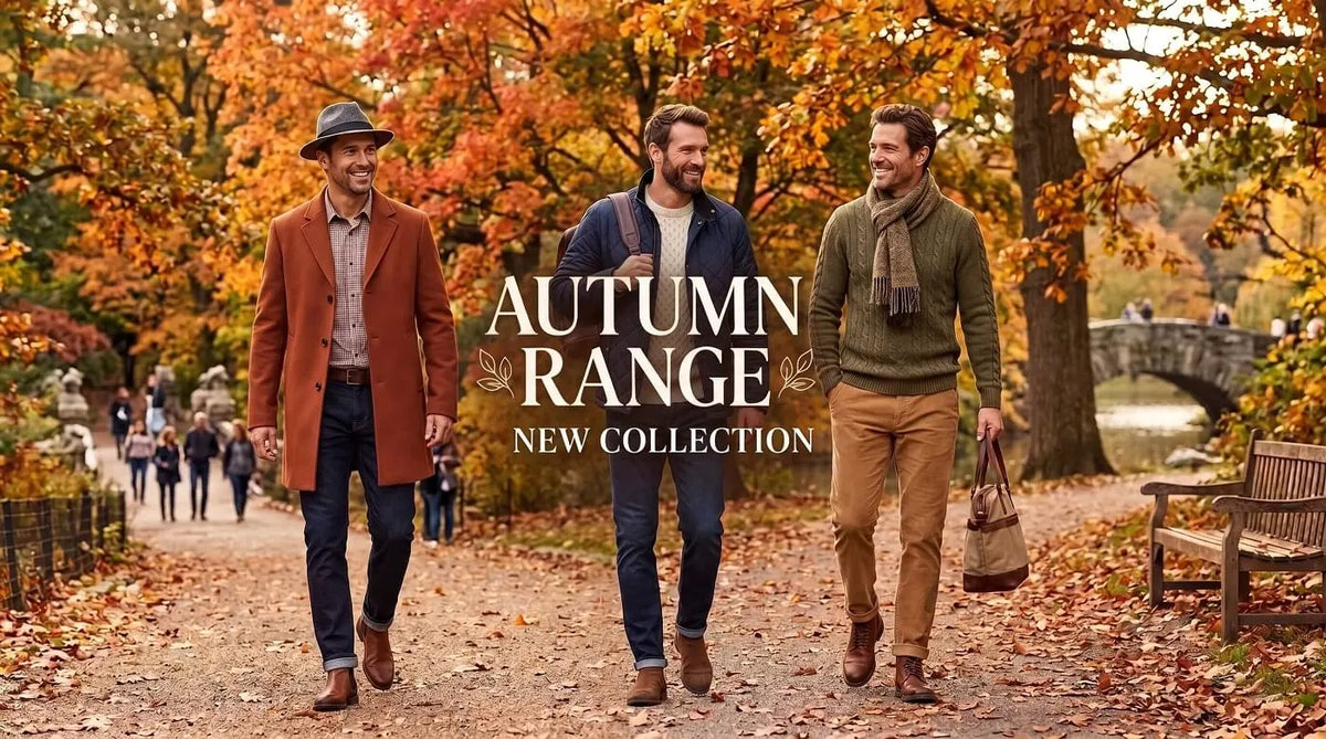 Three men walking along an autumn park path with orange and yellow foliage, wearing coordinated fall outfits. 