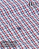 Close-up of a red, white, and blue plaid fabric with 'IQ's Drifter' branding.