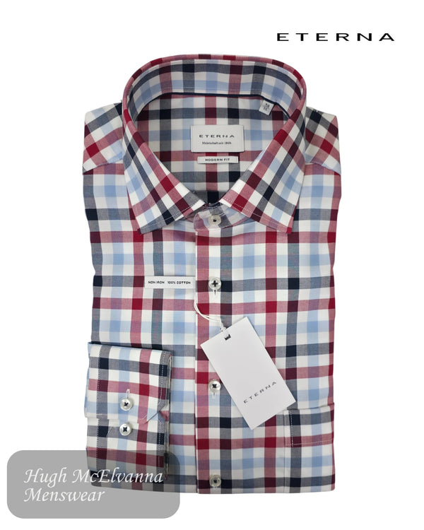 Plaid shirt with a tag on a white background, featuring the Eterna brand.