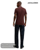 Angled mid-shot of a male model showcasing a Jack and Jones smart casual fire brick red cotton polo shirt.