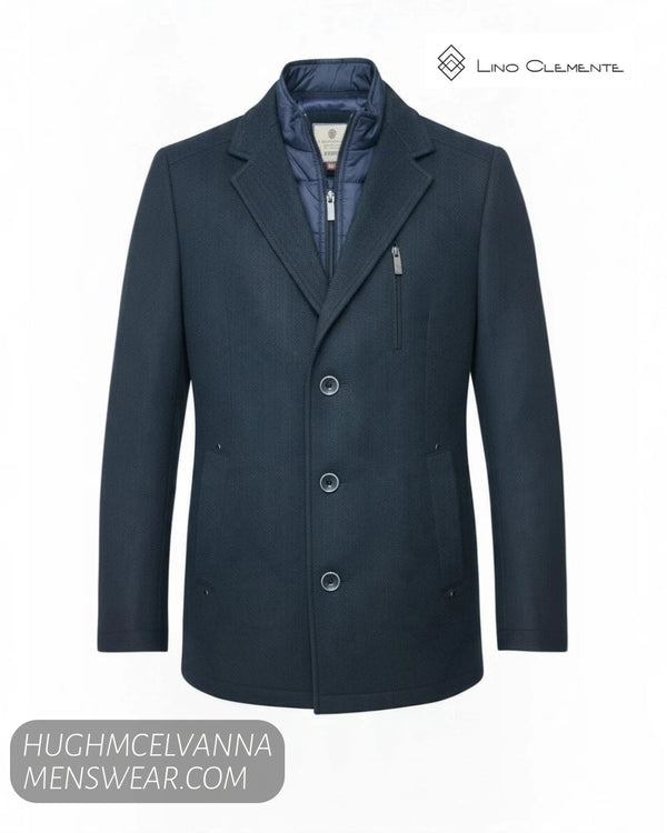 Studio ghost mannequin display of Lino Clemente SAKAI navy herringbone 2-in-1 car coat showing buttons and chest zip pocket