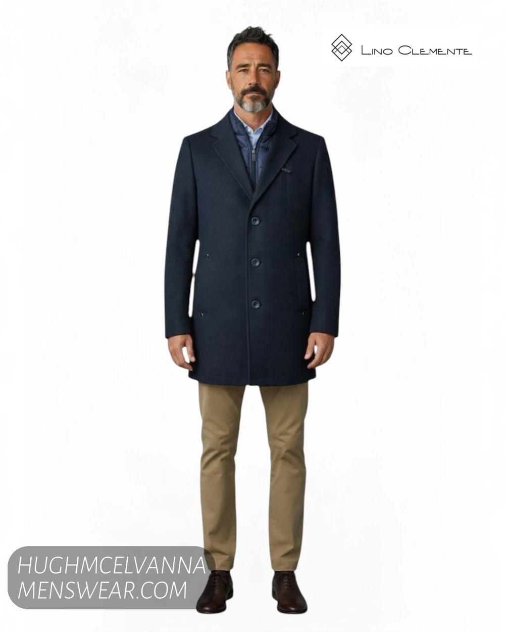 Full length studio model shot wearing Lino Clemente SAKAI navy herringbone car coat with beige chinos and brown shoes