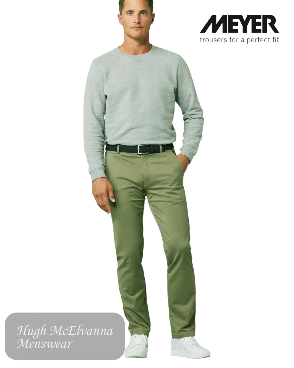 Man wearing a light gray sweater and green pants with 'Meyer' branding in style 3001/26