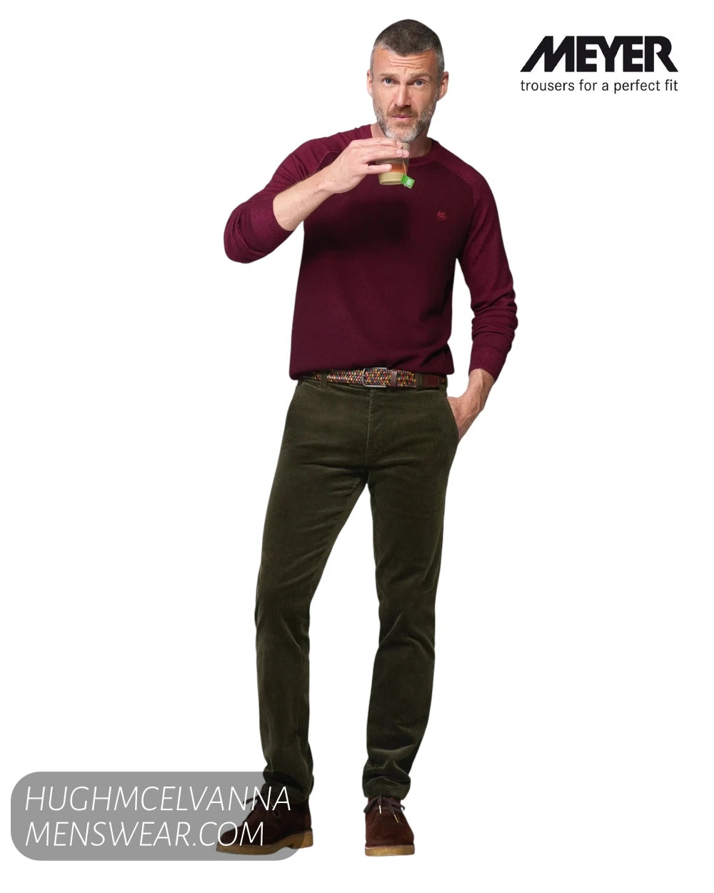 Full length studio model view wearing Meyer Roma 3708/29 olive green corduroy trousers with burgundy sweater and suede shoes