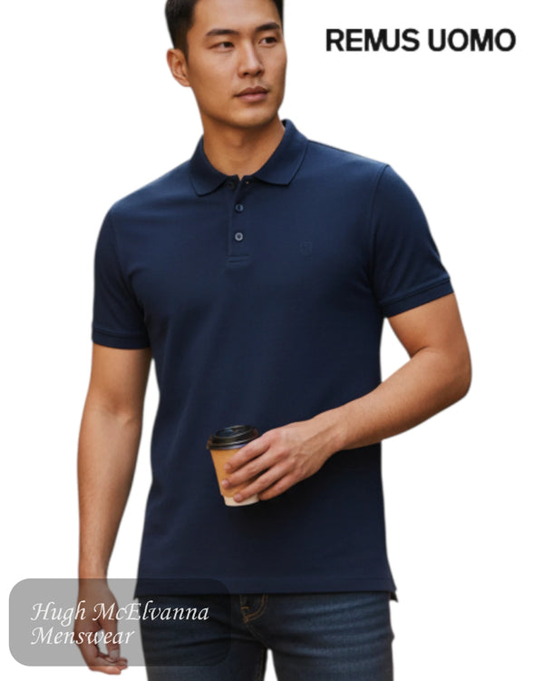 Man wearing Remus Uomo dark blue short sleeve polo shirt with tailored fit and embroidered chest logo.
