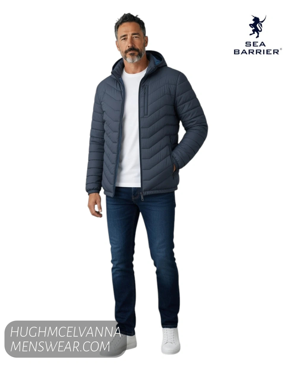 Full length model view wearing regular fit Sea Barrier FLORIANO navy jacket with blue jeans and white trainers