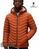 Portrait close up view of model wearing Sea Barrier FLORIANO copper puffer jacket with hood and zipped chest pocket