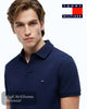 Man wearing a navy blue Tommy Hilfiger polo shirt on a white background
