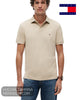 Front studio view of model wearing Tommy Hilfiger Sandalwood regular fit polo shirt