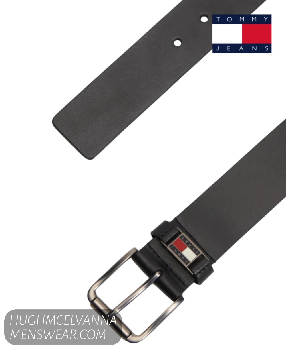 Flat lay view of Tommy Jeans Roller black full grain leather belt with buckle and flag logo keeper