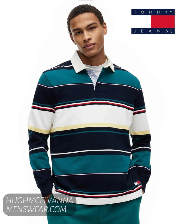 Front view of male model wearing Tommy Jeans multi-stripe long sleeve rugby shirt with white collar