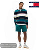 Full length model view wearing Tommy Jeans striped rugby shirt with teal shorts and retro trainers