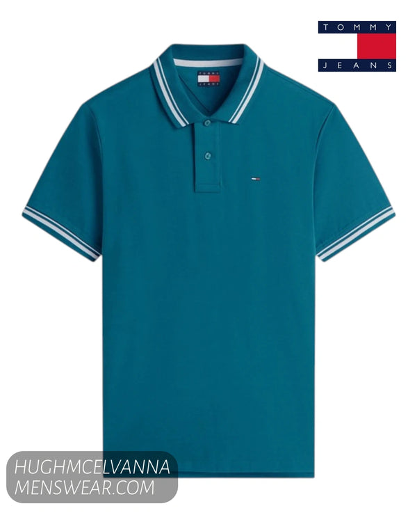 Flat lay product display of Tommy Jeans men's Polar Teal tipped polo shirt DM0DM22709L8J showing white collar tipping
