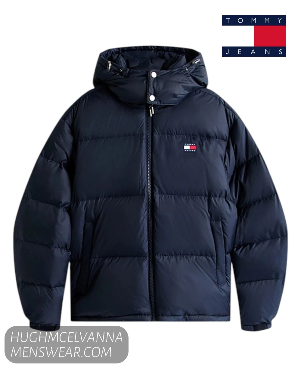 A navy blue hooded puffer jacket from Tommy Jeans, featuring horizontal quilting, a front zipper, and the signature Tommy Hilfiger flag logo on the left chest. 