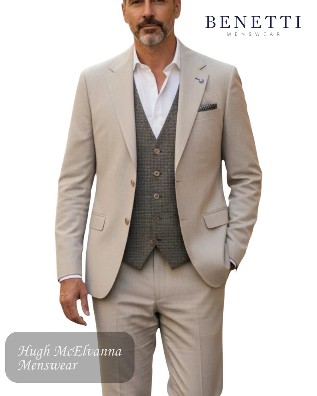 Man wearing a Benetti London beige suit with a vest, standing against a white background.