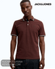 Secure button closure and contrast tipped collar detailing on a male youth or adult fashion shirt