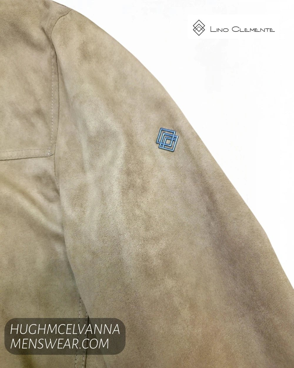 Close up detail of metal Lino Clemente diamond emblem on tan faux suede jacket sleeve