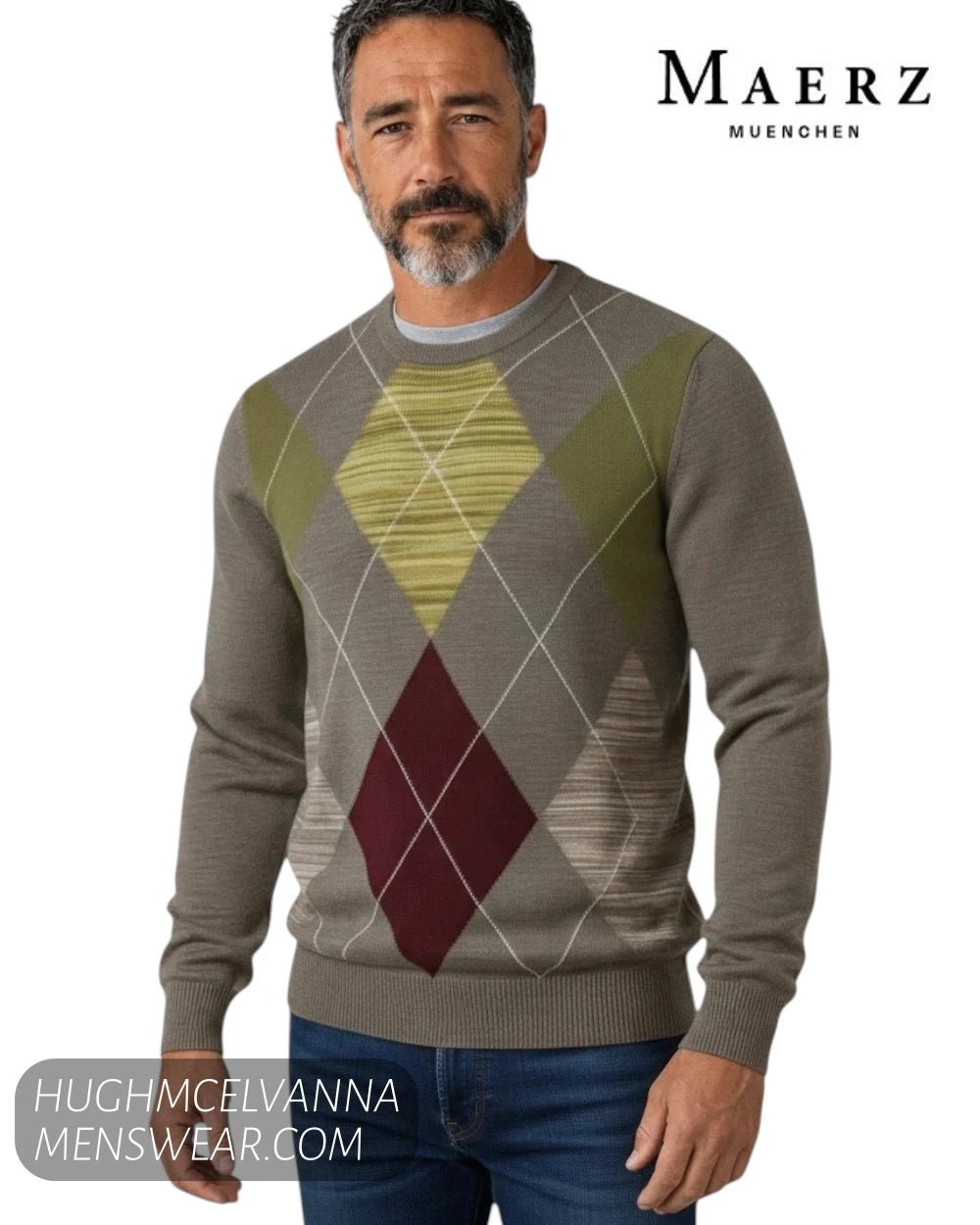 Close up front view of male model wearing Maerz Muenchen taupe argyle patterned crew neck jumper with lime, olive, and burgundy diamond intarsia