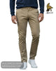 Close up view of model wearing Mineral Darwin tobacco stretch chinos with white trainers