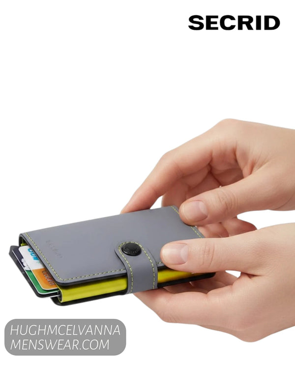 Luxury unisex soft-touch premium grey leather pocket card holder with lime accents available at Hugh McElvanna Menswear.