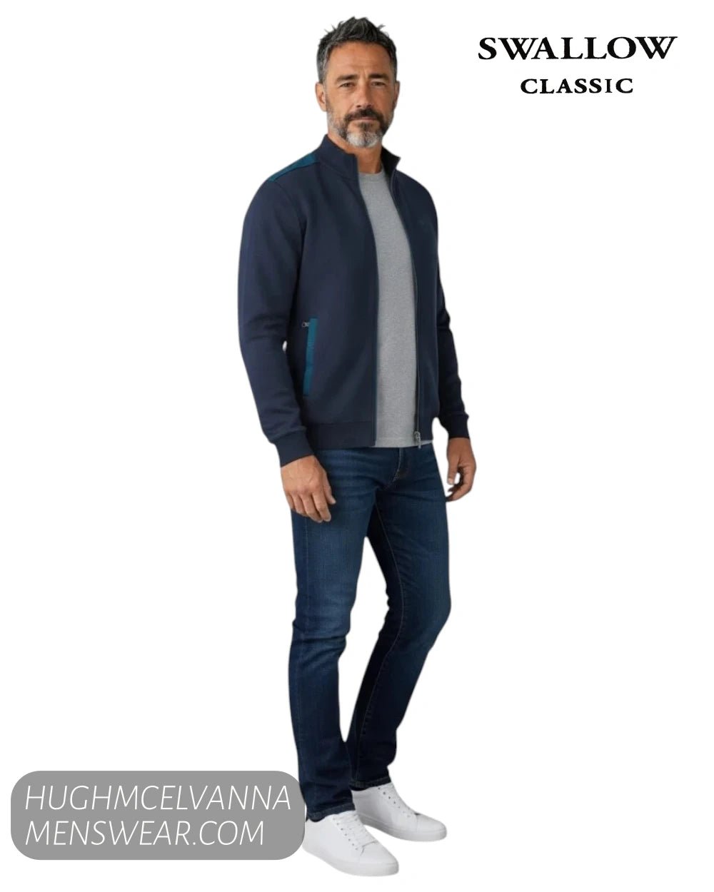Full length model view wearing Swallow Palco navy knitted jacket AW2600 with grey t-shirt, jeans, and trainers