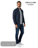 Full length model view wearing Swallow Palco navy knitted jacket AW2600 with grey t-shirt, jeans, and trainers