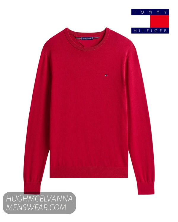 Flat lay studio display of Tommy Hilfiger MW0MW39999XLD red cotton crew neck jumper with embroidered chest flag