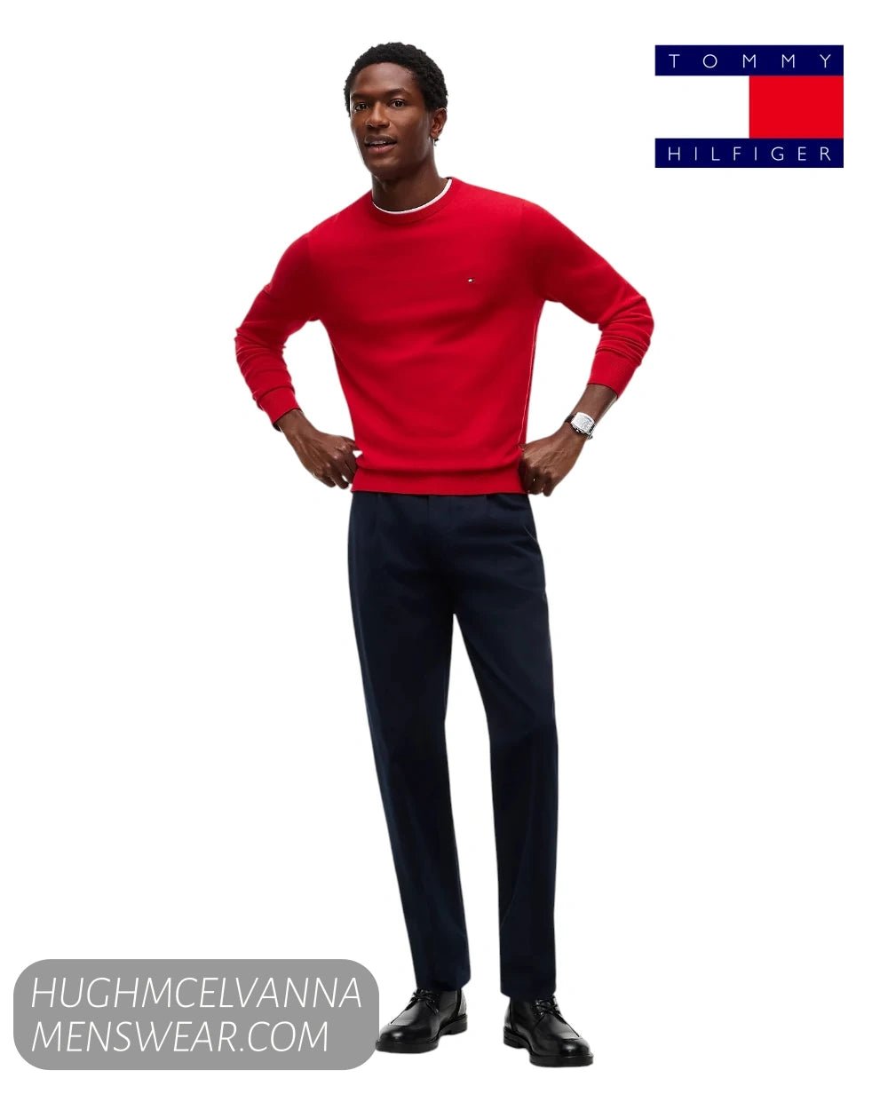 Full length model view wearing red Tommy Hilfiger crew neck sweater with navy trousers and black dress shoes