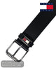 Tommy Jeans black leather belt with a silver-tone buckle and a small red, white, and blue logo accent on the buckle plate, shown on a white background with a Tommy Jeans logo in the top right.