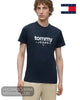 Half length view of model wearing Tommy Jeans navy graphic t-shirt with hands by his side