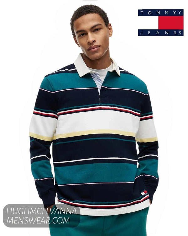 Front view of male model wearing Tommy Jeans multi-stripe long sleeve rugby shirt with white collar
